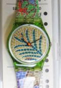 A Swatch watch in Byzanthium pattern 1990, original packaging, new battery within box.