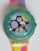 A Scuba 200 Swatch watch in Sea Grapes pattern, original packaging, new battery within box.