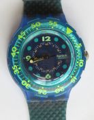 A Scuba 200 Swatch watch in Blue Moon pattern, original packaging, new battery within box.