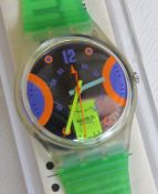 A Swatch watch in Stream pattern, original packaging, new battery within box.