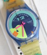 A Swatch watch in Nose Wheelie pattern, original packaging, new battery within box.