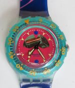 A Scuba 200 Swatch watch in Happy Fish pattern, original packaging, new battery within box.