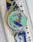 A Swatch watch in Montebella pattern, original packaging, new battery within box.