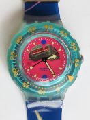 A Scuba 200 Swatch watch in Happy Fish pattern, original packaging, new battery within box.