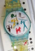 A Swatch watch in Bongo pattern, original packaging.
