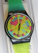 A Swatch watch in World Record pattern 1990, original packaging, new battery within box.