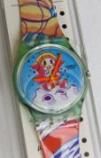 A Swatch watch in Yuri pattern, original packaging, new battery within box.
