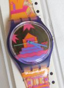 A Swatch watch in Rara Avis pattern, original packaging, new battery within box.