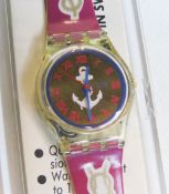A Swatch watch in Red Knot pattern 1992, original packaging, new battery within box.