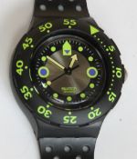 A Scuba 200 Swatch watch in Shamu / Black Wave pattern, original packaging, new battery within box.
