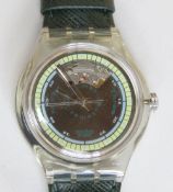 An automatic Swatch watch in Francois pattern, within original packaging.