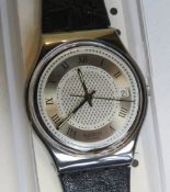 A Swatch watch in Beau pattern, original packaging, new battery within box.