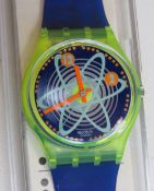 A Swatch watch in Wave Rebel pattern, original packaging, new battery within box.