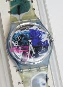 A Swatch watch in Photoshooting pattern, original packaging, new battery within box.