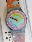A Swatch watch in Betty Lou pattern, original packaging.