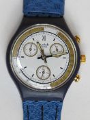 A Chrono Swatch watch in Skipper pattern, original packaging, new battery within bag.