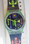 A Swatch watch in Stale Fish pattern 1991, original packaging, new battery within box.