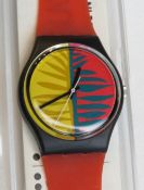 A Swatch watch in Waipitu pattern, original packaging, new battery within box.