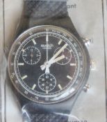 A Chrono Swatch watch in Black Friday pattern, part packaging, new battery within bag.