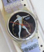 A Swatch watch in Discobolus pattern, original packaging, new battery within box.