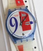 A Swatch watch in Bold Face pattern, original packaging, new battery within box.