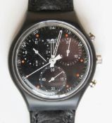 A Chrono Swatch watch in Wall Street pattern, original packaging, new battery within bag.