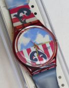 A Swatch watch in The Boss pattern 1991, original packaging, new battery within box.