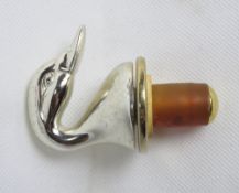 A swan head design bottle stopper.