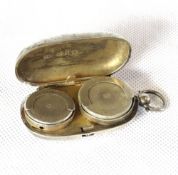 A hallmarked silver sovereign holder.