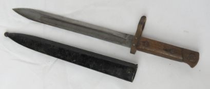 A bayonet with metal sheath.