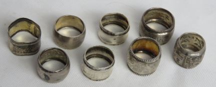 A quantity of small size white metal napkin rings, various indistinct marks upon.