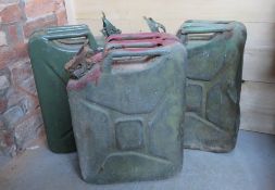 Three jerry cans, two having broad arrow mark upon.