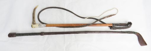 A hunting whip with hallmarked silver collar and horn handle, together with a riding crop.