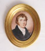 A delightful miniature portrait of a 19th century gentleman, frame naively repaired to back.