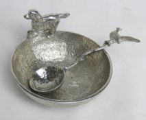 A National Trust design bowl and spoon having Spaniel hunting dog and pheasant design,