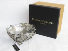 An as new in box Culinary Concepts starfish pattern bowl with glass liner.