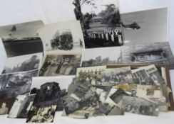 A quantity of black and white photographs mostly military themed including tank, RAF officers party,