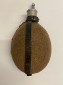 A WWII German water bottle, lid marked R