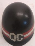 A US M1 QC helmet with Vietnamese Police