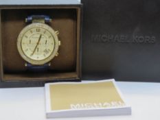 A Michael Kors ladies Parker Blue watch MK2280 with original box and manual.