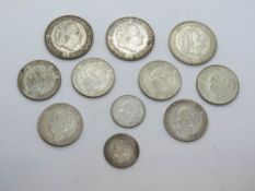 A quantity of Netherlands 1/2 G, 1G, and 2 1/2G coins c1921-66, 0.720 silver, total weight 115g.