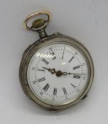 A German 800 silver ladies fob watch, having white enamel dial and shield engraving to back.