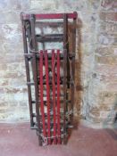 A wooden two child toboggan.