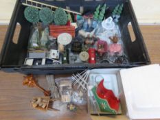 A quantity of dolls house outdoor decor including bistro sets, trees, Santa sleigh, bird house,