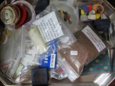 Two crates of dolls house making and decorating items including bricks, grass sheets, wallpaper,