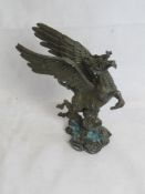 A Chinese bronze figurine of a mythical creature or longma.