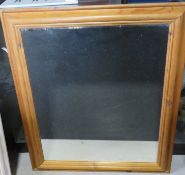 A large pine framed mirror 73 x 63cm