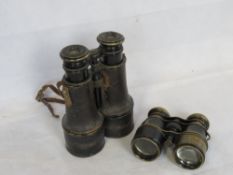 A pair of binoculars marked Rue De La Paix 24 A Paris Cam, together with a pair of opera glasses.