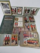A large quantity of assorted mostly military themed photographs, cards and drawings,