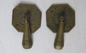 A delightful pair of Arts & Crafts drawer handles together a brass lion's mask pull handle.